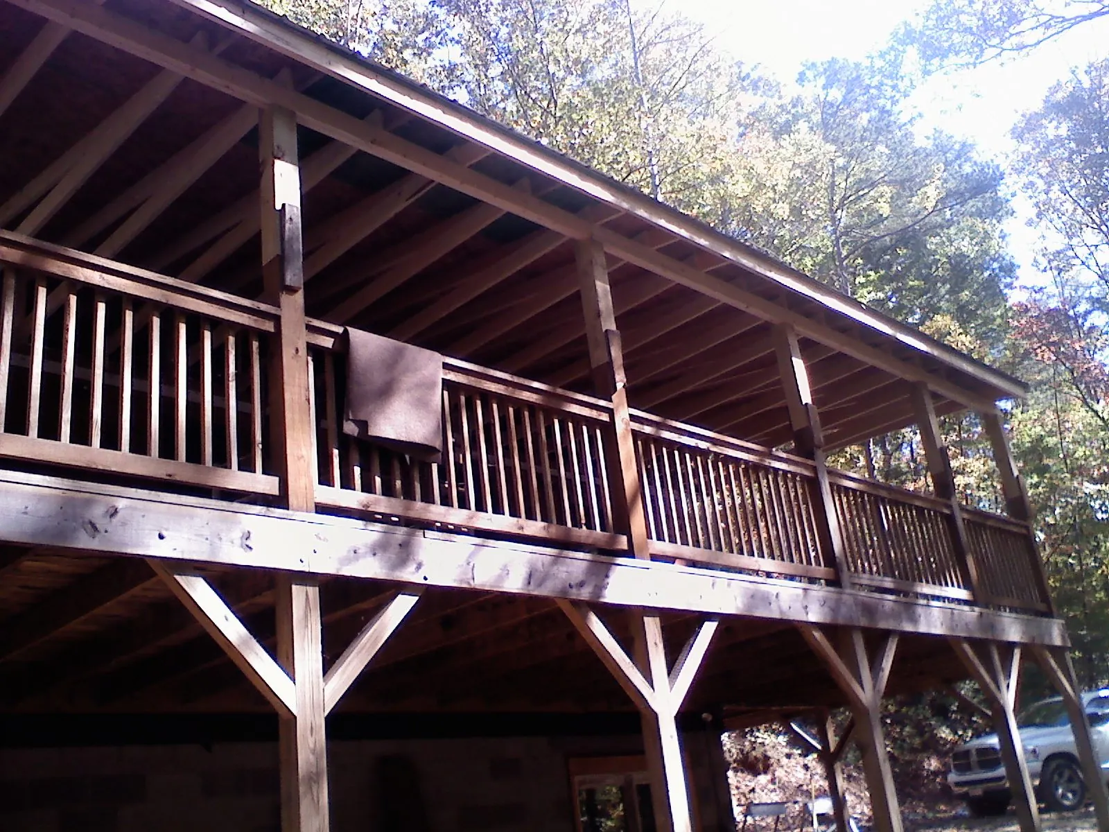 Timber framing under a new elevated porch and deck — Roof Leak Repair in Rimersburg by Roofing Brothers